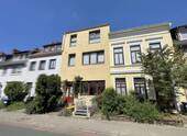 Frontansicht - 7 Zimmer Mehrfamilienhaus, Wohnhaus zum Kaufen in Bremen