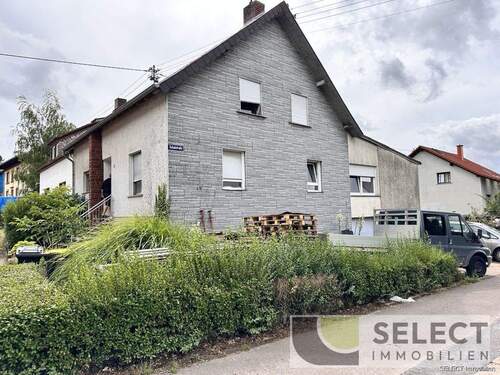 Seitenansicht - 5 Zimmer Mehrfamilienhaus, Wohnhaus zum Kaufen in Weiskirchen / Konfeld