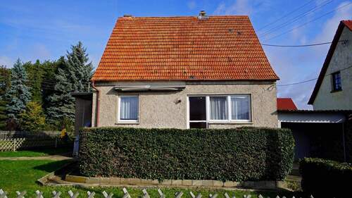 Straßenansicht des klassichen DDR-Typenhauses EW 65 - Einfamilienhaus mit 120,10 m&sup2; in Magdala zum Kaufen