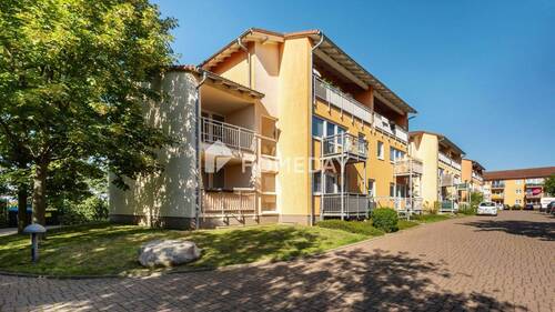 Außenansicht 2 - Gepflegte Wohnung in Beucha - mit Südbalkon, Einbauküche und eigenem Stellplatz