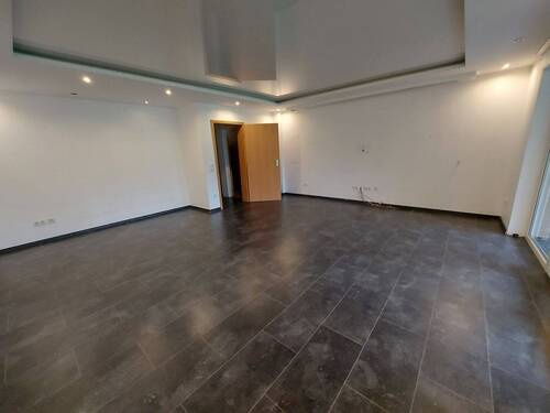 Wohnzimmer - 5 Zimmer Einfamilienhaus zum Kaufen in Kalkar