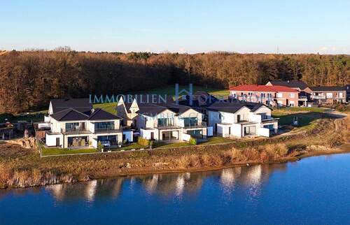 Ansicht - K 592-1 - Erstklassige Aussicht - Fantastisches Wohngefühl! Bezugsfertige Doppelhaushälfte direkt am See in Herzlake!
