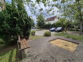 Stellplätze hinter dem Haus - 