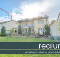 Solides 2-Familienhaus mit Wärmepumpe, PV & Entwicklungspotenzial - realunis - Neulußheim