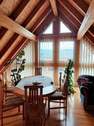 Giebel mit verglastem Fachwerk - 