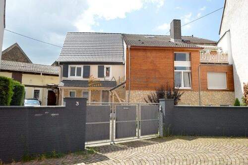 Häuseransicht - 1 Zimmer Mehrfamilienhaus, Wohnhaus zum Kaufen in Klein-Winternheim