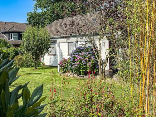 Gartenansicht - Einfamilienhaus mit 93,00 m² in Bredenbek zum Kaufen