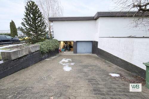 Hausansicht Tiefgarage - Wohnen mit Wellnessfaktor - Stilvolles Zuhause mit Sauna und Schwimmbad