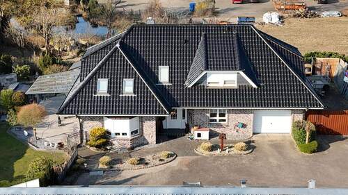 EFH - Ansicht 1 - 4 Zimmer Einfamilienhaus zum Kaufen in Henstedt-Ulzburg