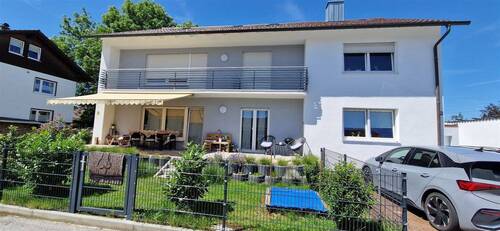 Außenansicht - Sonnendurchflutete Erdgeschosswohnung mit großer Südterrasse und Garten!!!