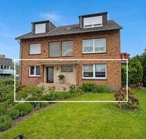Komfortable Erdgeschosswohnung mit Terrasse, Kamin und großem Gemeinschaftsgrundstück in Spellen! - Voerde