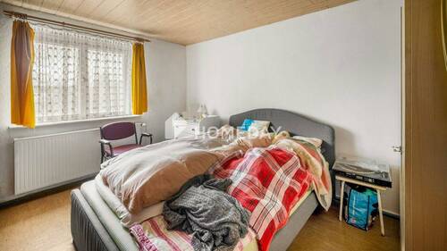 1. OG Schlafzimmer 1 - 