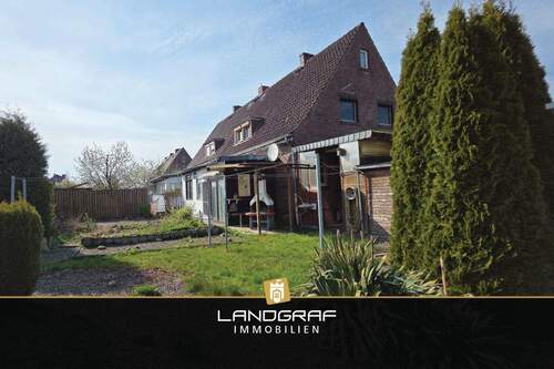 Ansicht Garten - 4 Zimmer Mehrfamilienhaus, Wohnhaus zum Kaufen in Dünsen