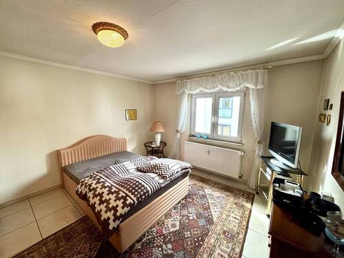 Schlafzimmer 1 Haus 1 - 