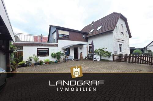 Wohnhaus - Mehr als nur ein Einfamilienhaus – Großes Grundstück mit Extra-Gartenhaus & vielseitigen Nutzungsmöglichkeiten!