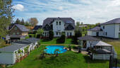 Garten - Moderne Eigentumswohnung mit großem Balkon & Pool - ideal als stilvoller Zweitwohnsitz oder komfortables Zuhause