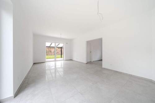 Wohnzimmer - 3 Zimmer Bungalow zum Kaufen in Westoverledingen