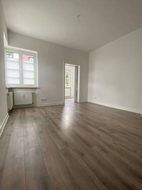 Wohnzimmer (EG rechts) - Mehrfamilienhaus, Wohnhaus in Bad Oeynhausen