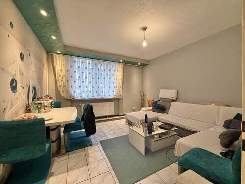 Wohnzimmer - Etagenwohnung mit 60,00 m&sup2; in Offenbach zum Kaufen