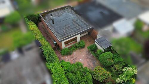 Ansicht - Bezugsfreies Reihenendhaus mit Garten und vermieteter Garage in Oldenburg-Bürgerfelde