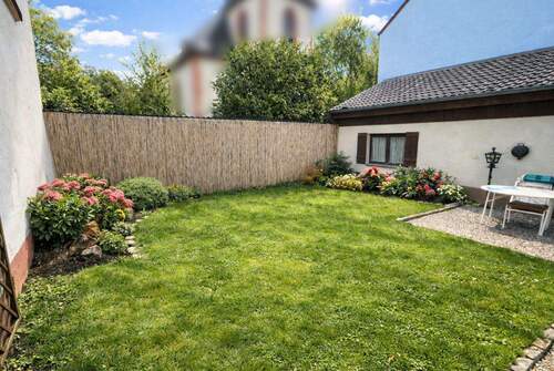 Titelbild - Wohnen mit Charme und Potenzial - Einfamilienhaus mit Garten und Garage