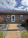 Haupteingang - Bungalow mit 89,00 m&sup2; in Ostrhauderfehn zum Kaufen