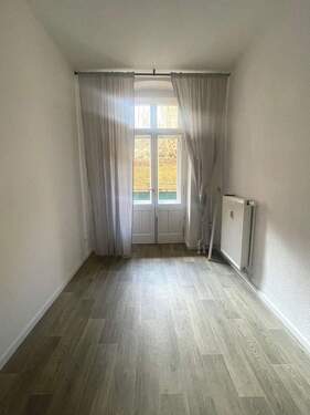 Schlafzimmer - Erdgeschosswohnung mit Balkon und Einbauküche