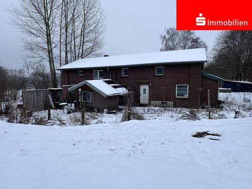 Frontansicht - Zweifamilienhaus mit Ausbaureserve auf großem Grundstück