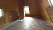 Ein Zimmer im Dachgeschoss - 