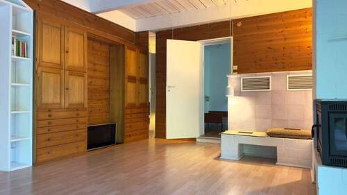 Wohnzimmer mit Kachelofen - 