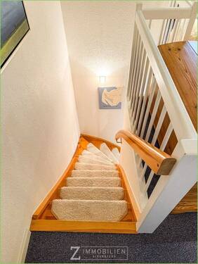 Treppe ins Dachgeschoss - 3 Zimmer Etagenwohnung in Sankt Peter-Ording