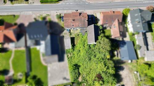 Bild 3 - 8 Zimmer Mehrfamilienhaus, Wohnhaus in Butjadingen