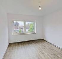 Großzügig geschnittene 3-Zimmer-Wohnung mit EBK und Wannenbad im Norden von Bordesholm