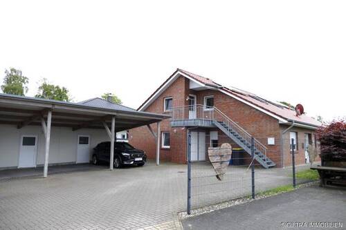Bild 3 - 7 Zimmer Mehrfamilienhaus, Wohnhaus in Barßel