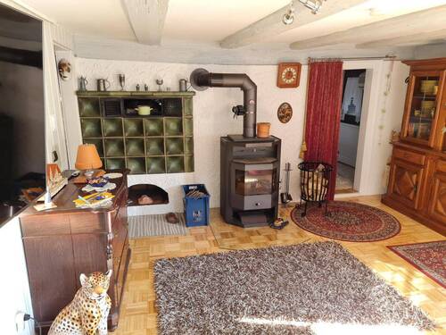Wohnzimmer Kachelofen - Bauernhaus, Landhaus mit 165,00 m&sup2; in Eberdingen zum Kaufen