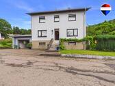 REMAX Immobilien Delux Haus in Büschfeld zu verkaufen - Familienhaus mit viel Platz, großer Garage und vielseitigen Nutzungsmöglichkeiten in Büschfeld