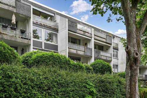Hausansicht - Lichtdurchflutete Eigentumswohnung in Waldrandnähe!
