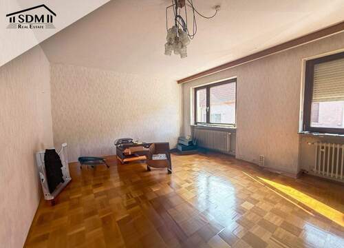 04_Wohnzimmer.jpg - Einfamilienhaus mit 147,00 m&sup2; in Philippsburg zum Kaufen
