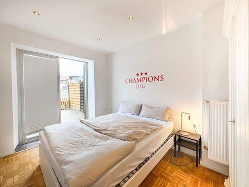 Schlafzimmer mit Zugang zur Sonnenloggia - 