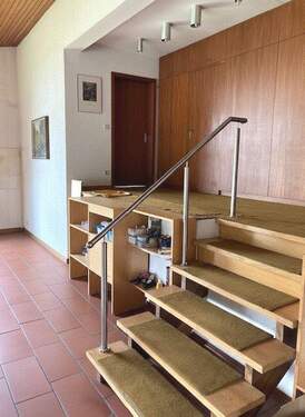 Aufgang zu den weiteren Zimmern. - 