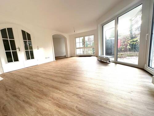 Wohnzimmer - Reihenmittelhaus mit 178,00 m² in Grünwald zum Kaufen