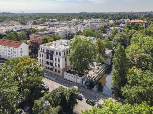 Firmensitz Künne Immobilien - Kleines Mehrfamilienhaus mit Mietergärten und Stellplätzen