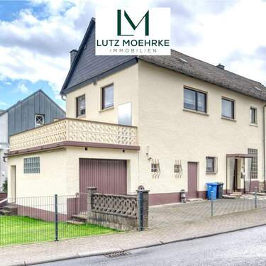 Titelbild mit Logo - Charmantes Familienhaus mit Garten und Garage - provisionsfrei