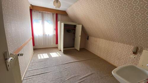 Zimmer im Dachgeschoss - 