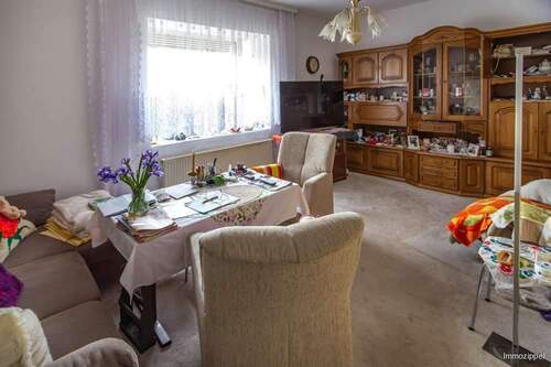 EG Großes Wohnzimmer mit Panoramafenster - 