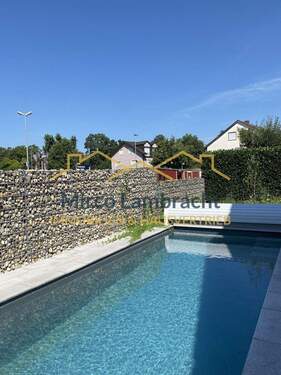 Beheizter Salzwasserpool - Einfamilienhaus mit 140,50 m&sup2; in Breisach am Rhein zum Kaufen