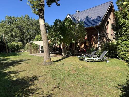 Hausansicht mit Garten - Einfamilienhaus mit 127,90 m&sup2; in Wieck a. Darß zum Kaufen