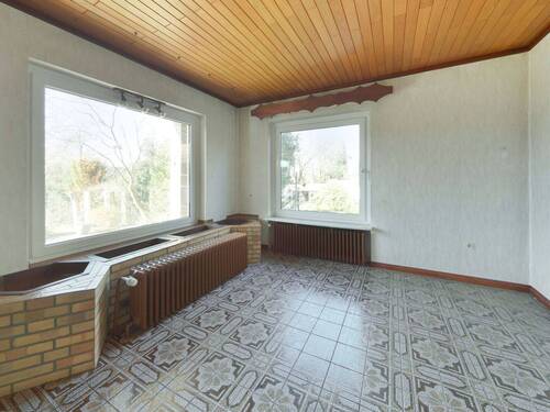 Wohnzimmer II - Einfamilienhaus mit 121,50 m&sup2; in Breitenburg zum Kaufen