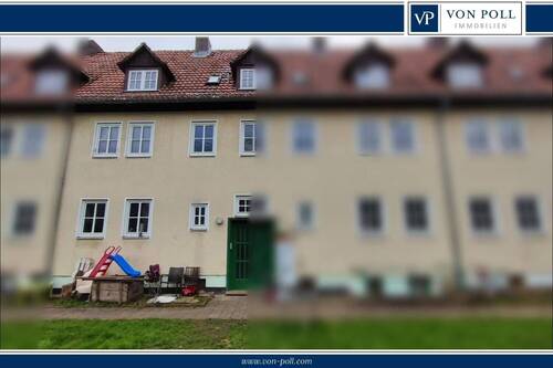 Haus_H Logo - Eine Hälfte des Mehrfamilienhaus mit sechs Wohneinheiten