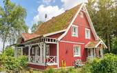 Ansicht - Massiv gebautes Landhaus mit Teich, Veranda und großem Garten